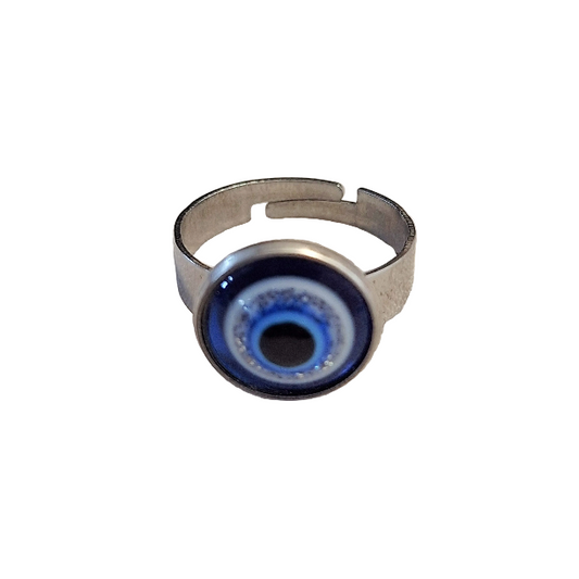 Silver ring with a blue and white eye design on a white background