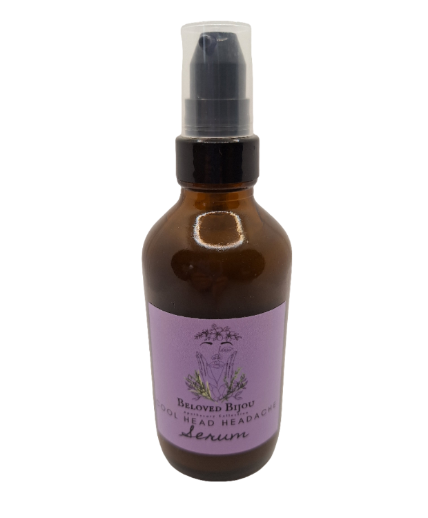 Amber glass bottle with a purple label on a white background