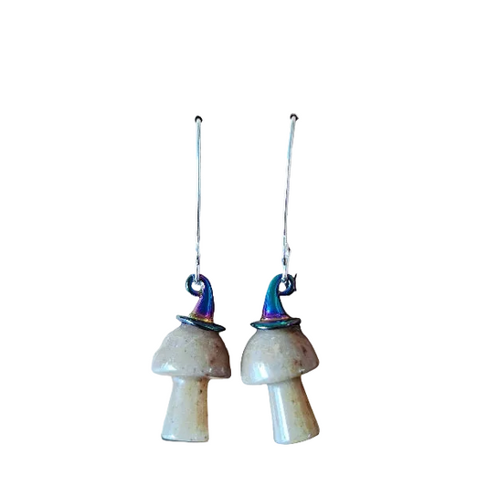 Pair of mushroom-shaped earrings with colorful tops on a white background