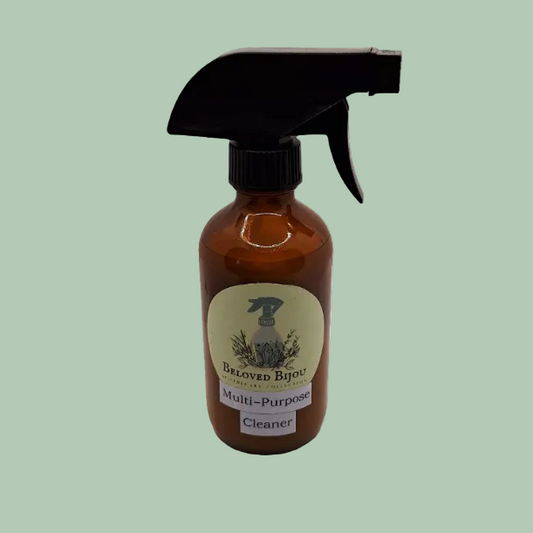 Brown spray bottle with black nozzle on a white background