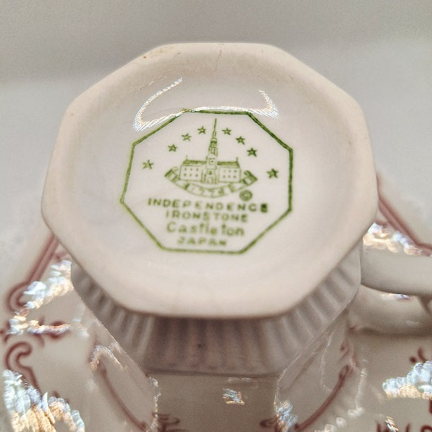Close-up of a ceramic product with a logo and text on a white background