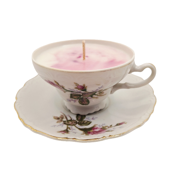 Soy wax Candle in a decorative teacup with red rose design on a white embossed background