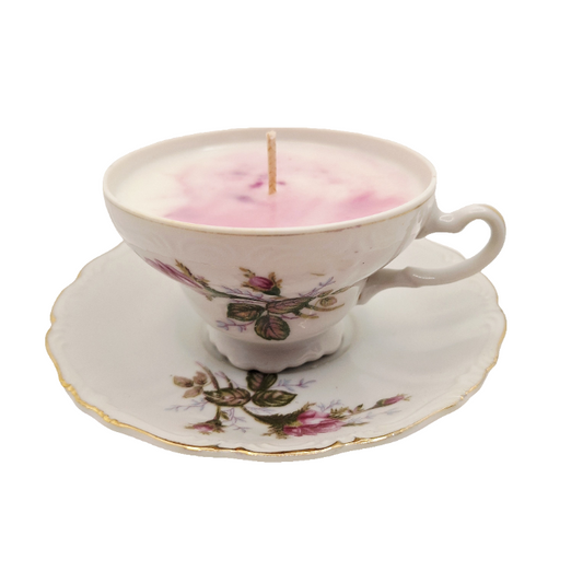 Soy wax Candle in a decorative teacup with red rose design on a white embossed background