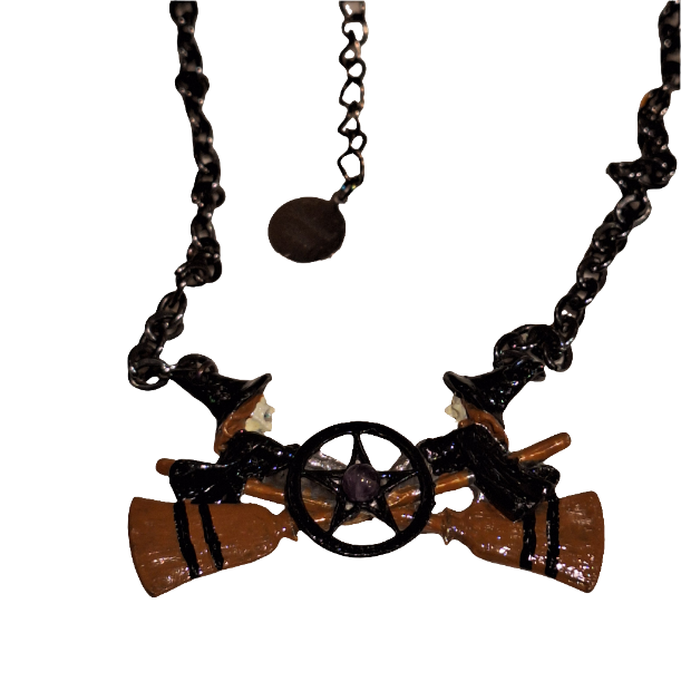 Necklace with a star and rifle pendant on a white background