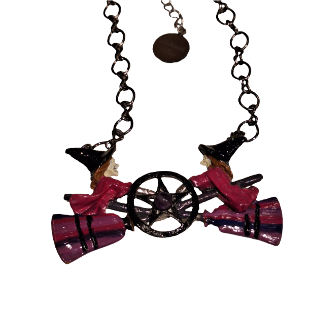 Necklace with red and black decorative elements on a white background