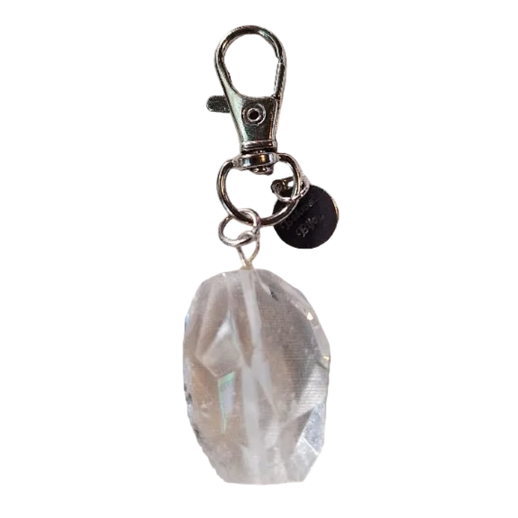 Crystal keychain with a metal clasp on a white background