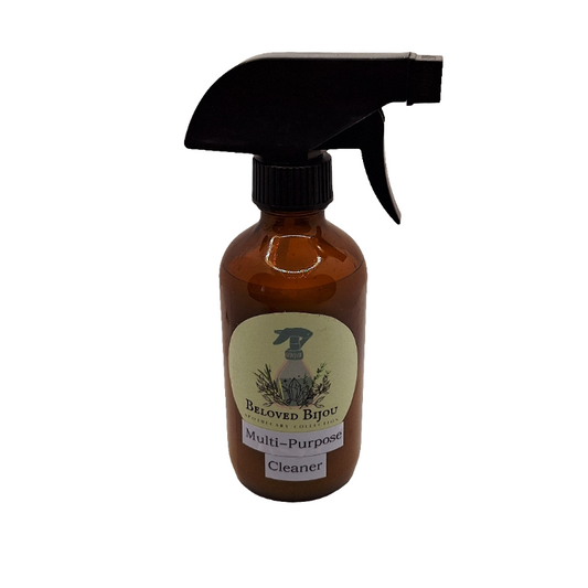 Brown spray bottle with black nozzle on a white background